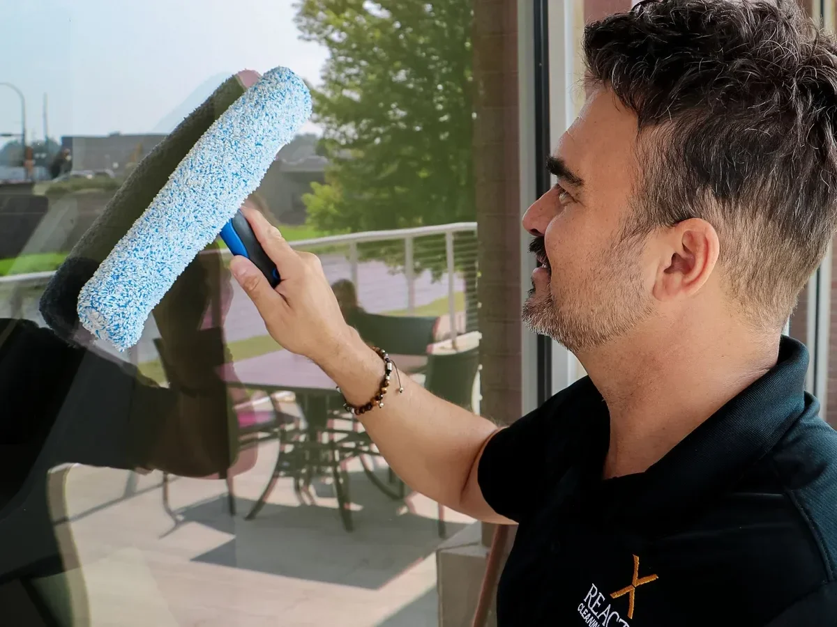 Professional window cleaning in action